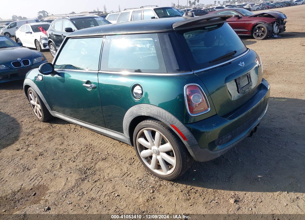 2009 MINI COOPER S VIN: WMWMF73519TW84341
