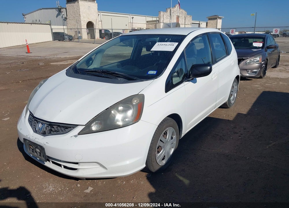 2009 HONDA FIT VIN: JHMGE88259S035024