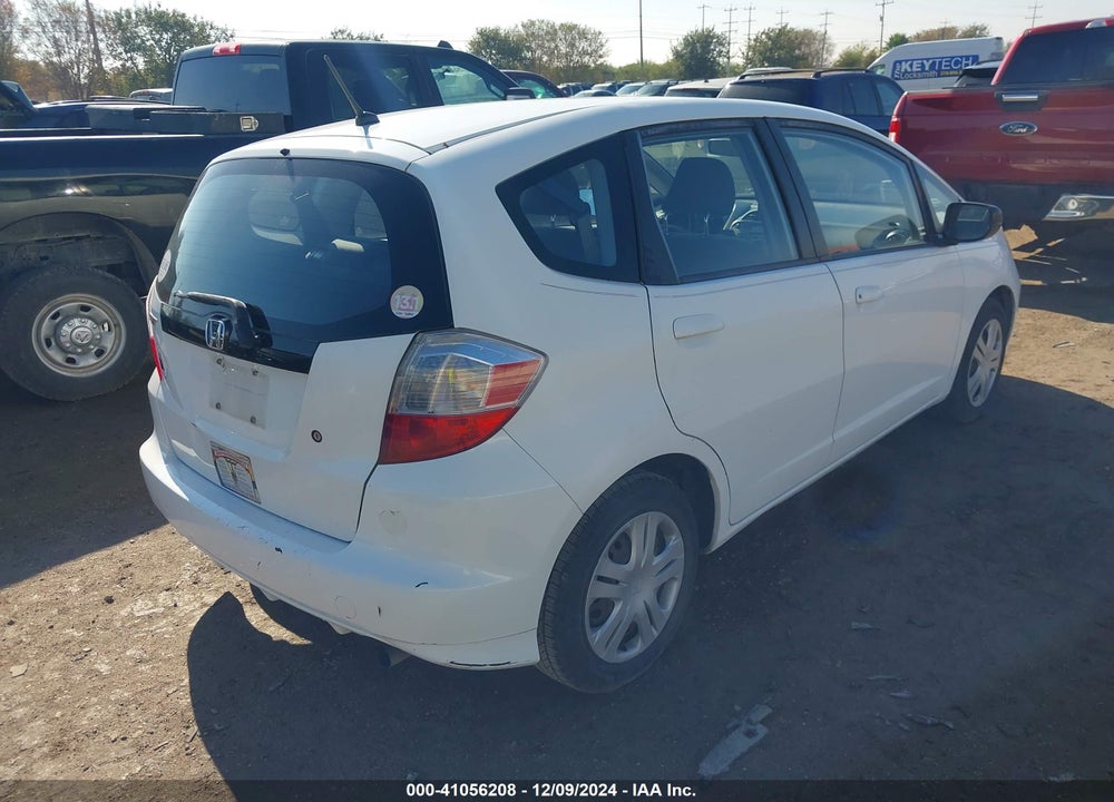 2009 HONDA FIT VIN: JHMGE88259S035024