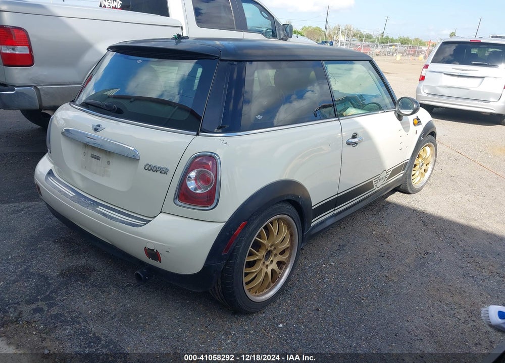 2011 MINI COOPER VIN: WMWSU3C5XBT098930