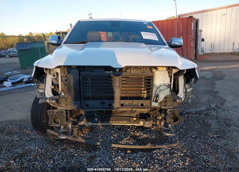 2020 RAM 1500 LAIE LONGHORN  4X4 5'7 BOX VIN: 1C6SRFKT0LN304484