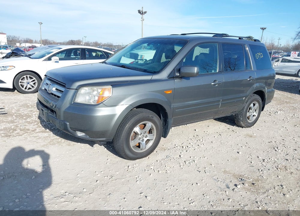 2007 HONDA PILOT EX-L VIN: 5FNYF18777B013817