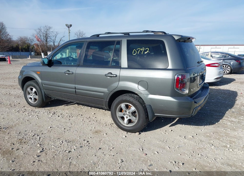2007 HONDA PILOT EX-L VIN: 5FNYF18777B013817