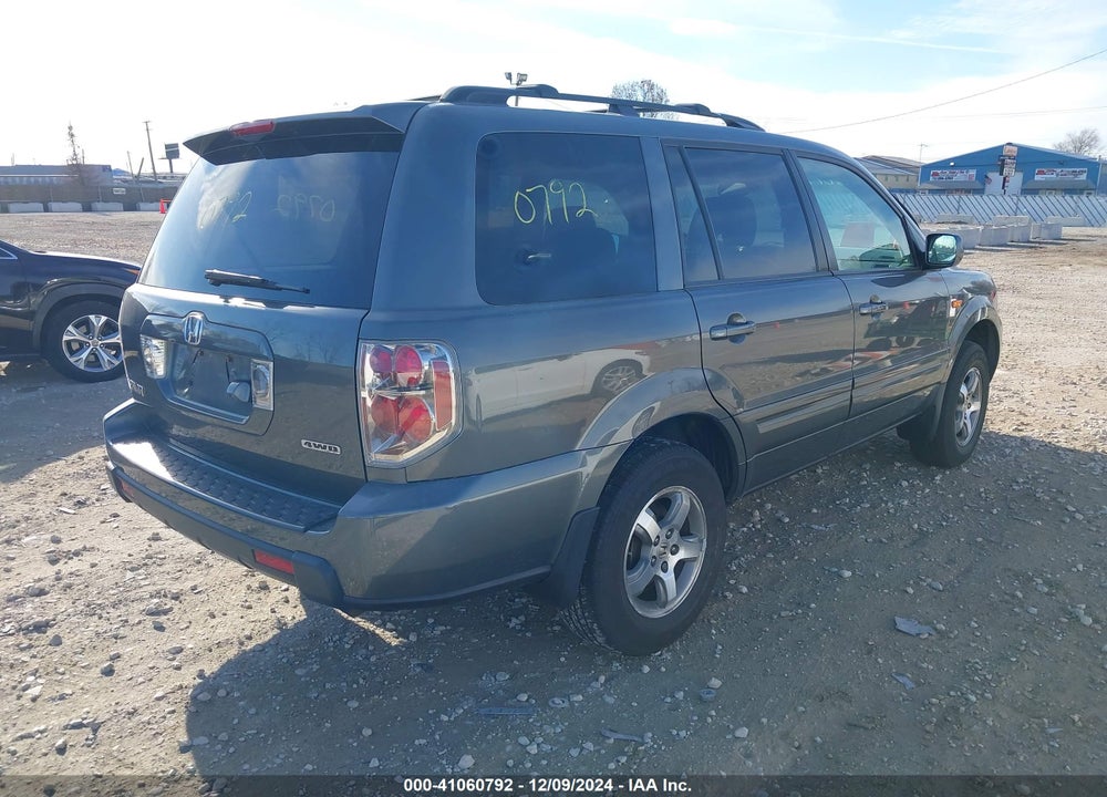 2007 HONDA PILOT EX-L VIN: 5FNYF18777B013817