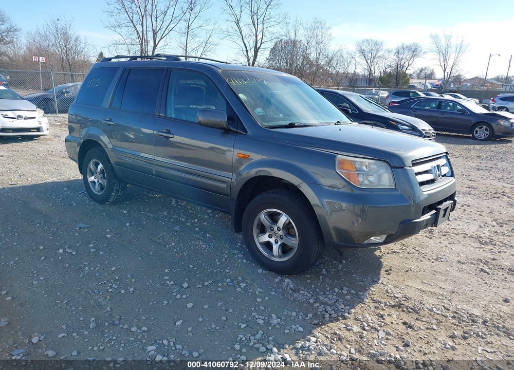 2007 HONDA PILOT EX-L VIN: 5FNYF18777B013817