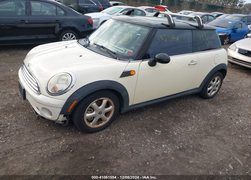 2010 MINI COOPER VIN: WMWMF3C56ATU79966