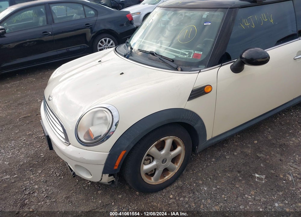 2010 MINI COOPER VIN: WMWMF3C56ATU79966