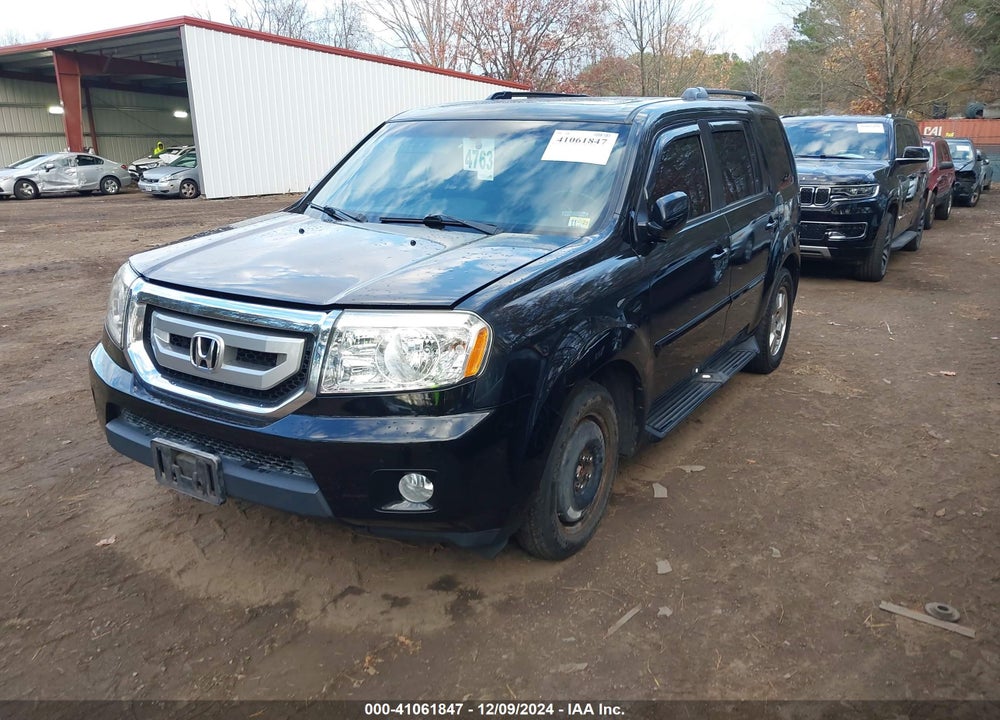 2011 HONDA PILOT EX-L VIN: 5FNYF4H70BB025883
