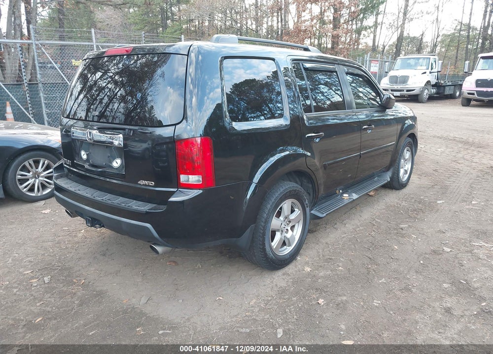 2011 HONDA PILOT EX-L VIN: 5FNYF4H70BB025883