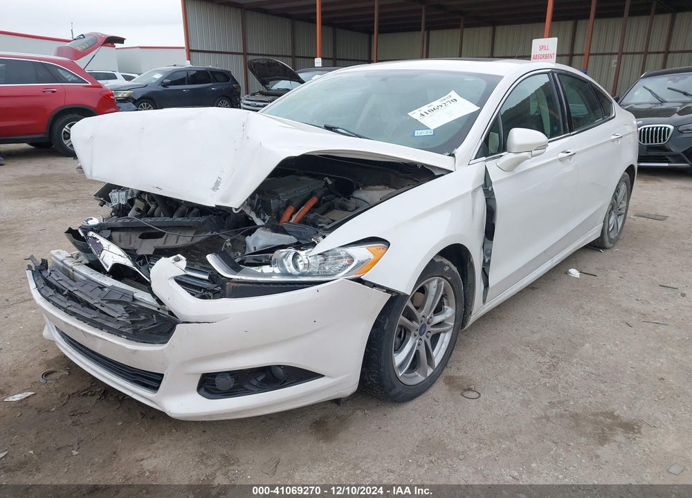 2016 FORD FUSION HYBRID TITANIUM VIN: 3FA6P0RU0GR371283