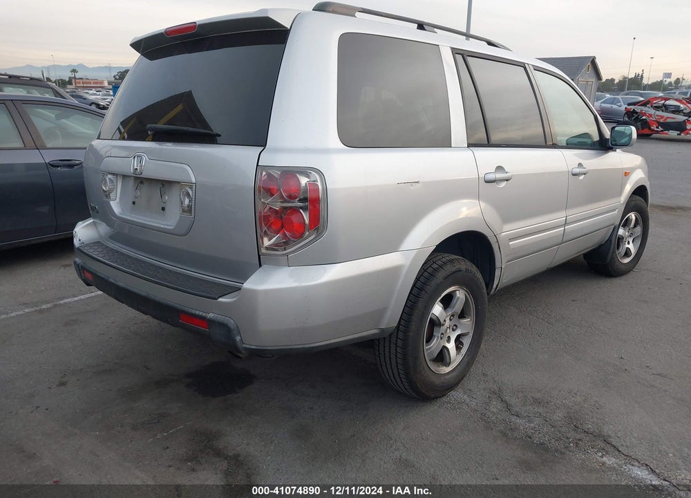 2006 HONDA PILOT EX-L VIN: 5FNYF285X6B049309