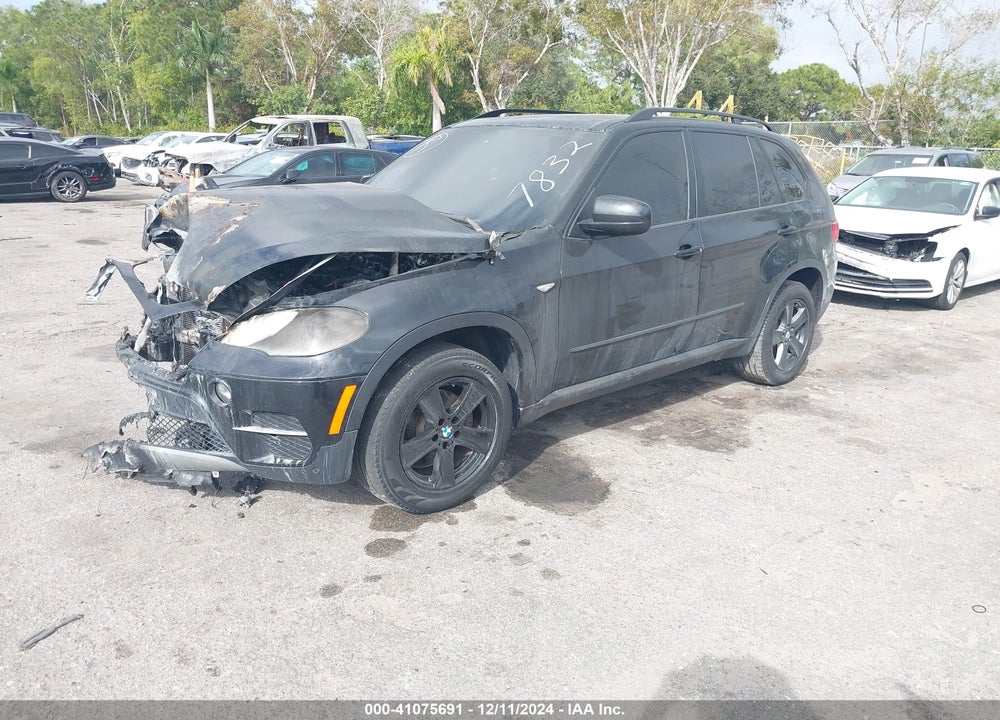 2012 BMW X5 XDRIVE35I/XDRIVE35I PREMIUM/XDRIVE35I SPORT ACTIVITY VIN: 5UXZV4C58CL767832