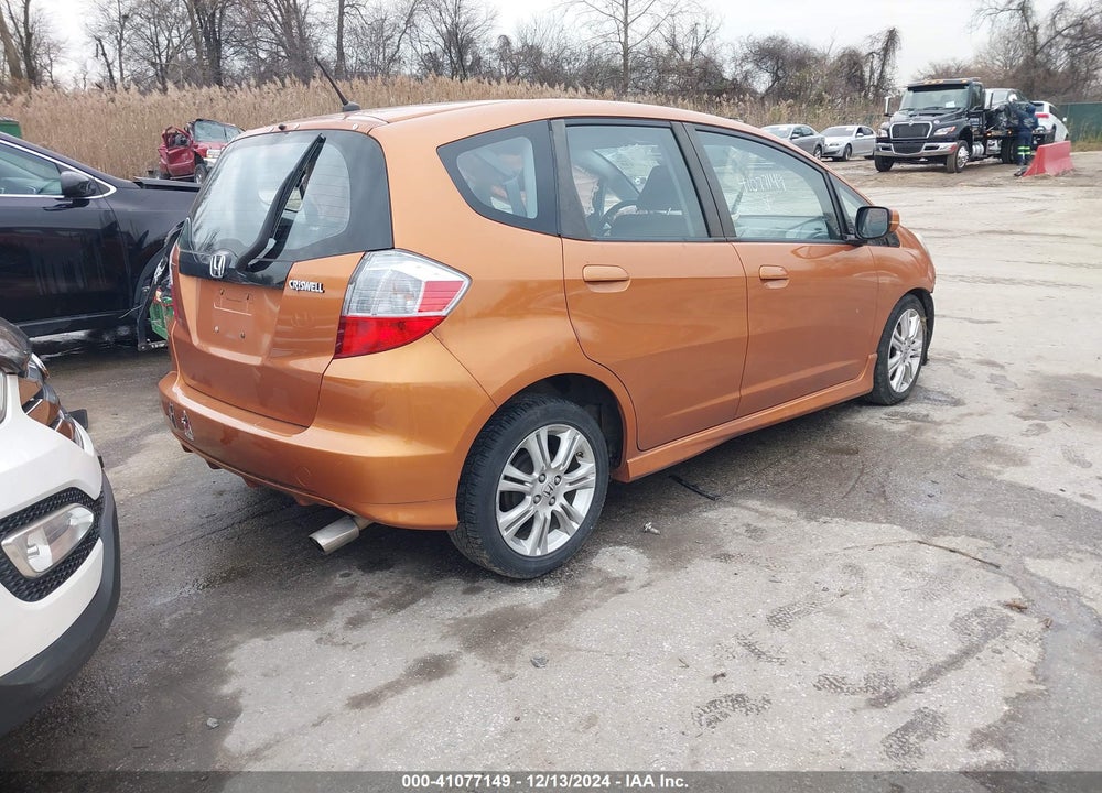 2011 HONDA FIT SPORT VIN: JHMGE8H58BS008691