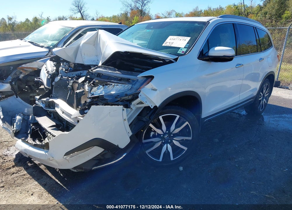 2021 HONDA PILOT 2WD TOURING 8 PASSENGER VIN: 5FNYF5H95MB014159