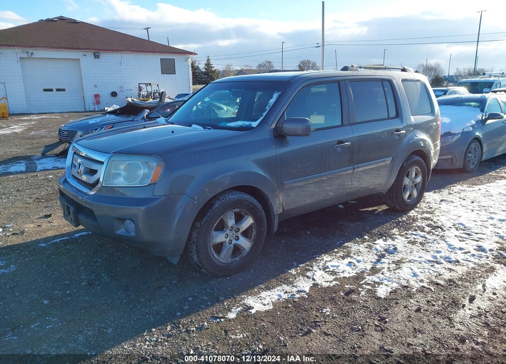 2011 HONDA PILOT EX-L VIN: 5FNYF4H60BB018441