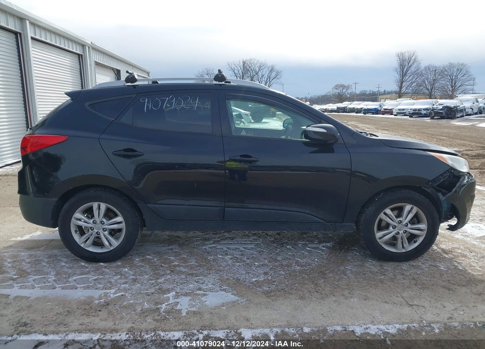2013 HYUNDAI TUCSON VIN: KM8JUCAC0DU738670
