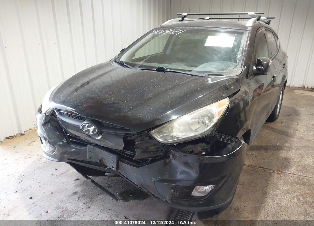 2013 HYUNDAI TUCSON VIN: KM8JUCAC0DU738670