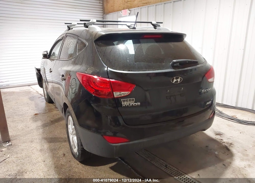 2013 HYUNDAI TUCSON VIN: KM8JUCAC0DU738670
