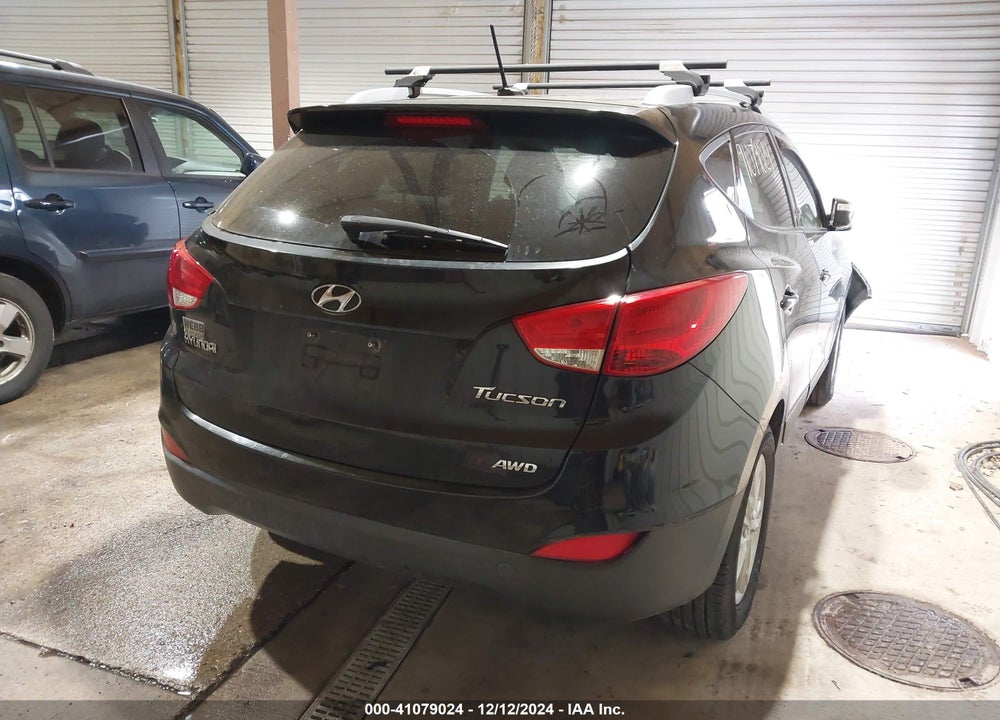 2013 HYUNDAI TUCSON VIN: KM8JUCAC0DU738670