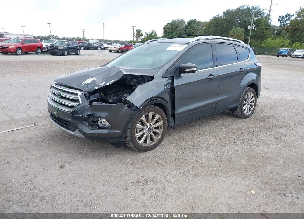 2018 FORD ESCAPE TITANIUM VIN: 1FMCU0J95JUD47585