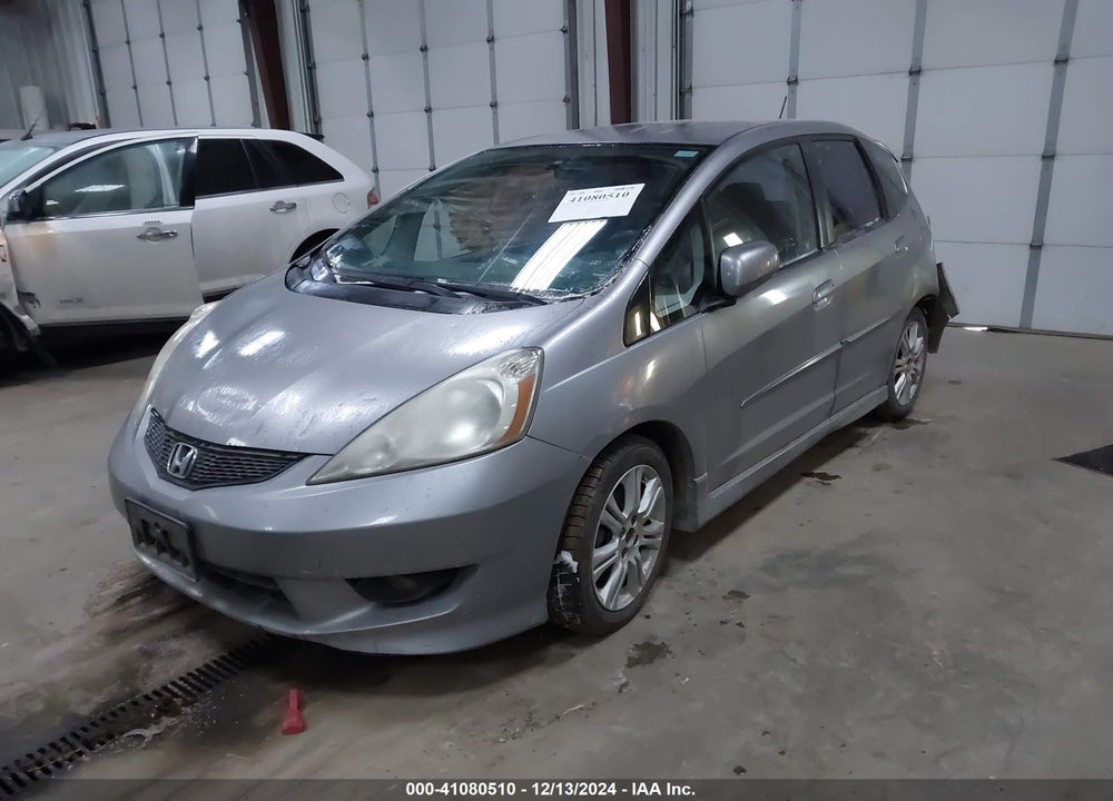 2009 HONDA FIT VIN: JHMGE88419S012485