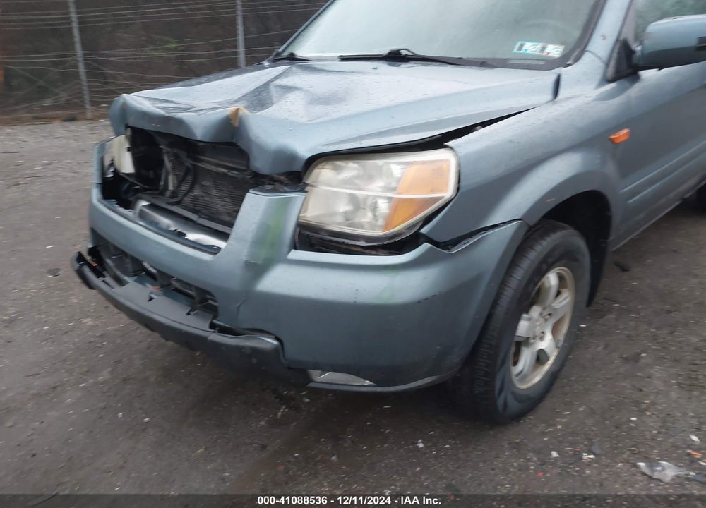 2007 HONDA PILOT EX-L VIN: 5FNYF18797B025063