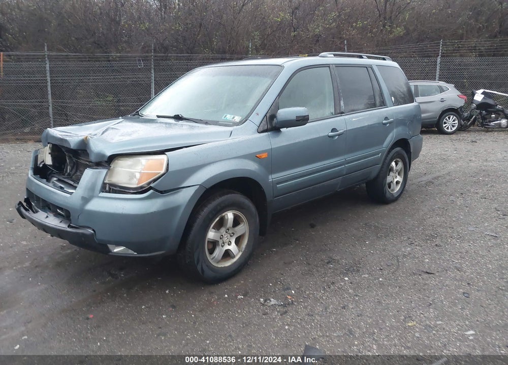 2007 HONDA PILOT EX-L VIN: 5FNYF18797B025063