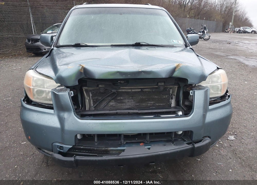 2007 HONDA PILOT EX-L VIN: 5FNYF18797B025063