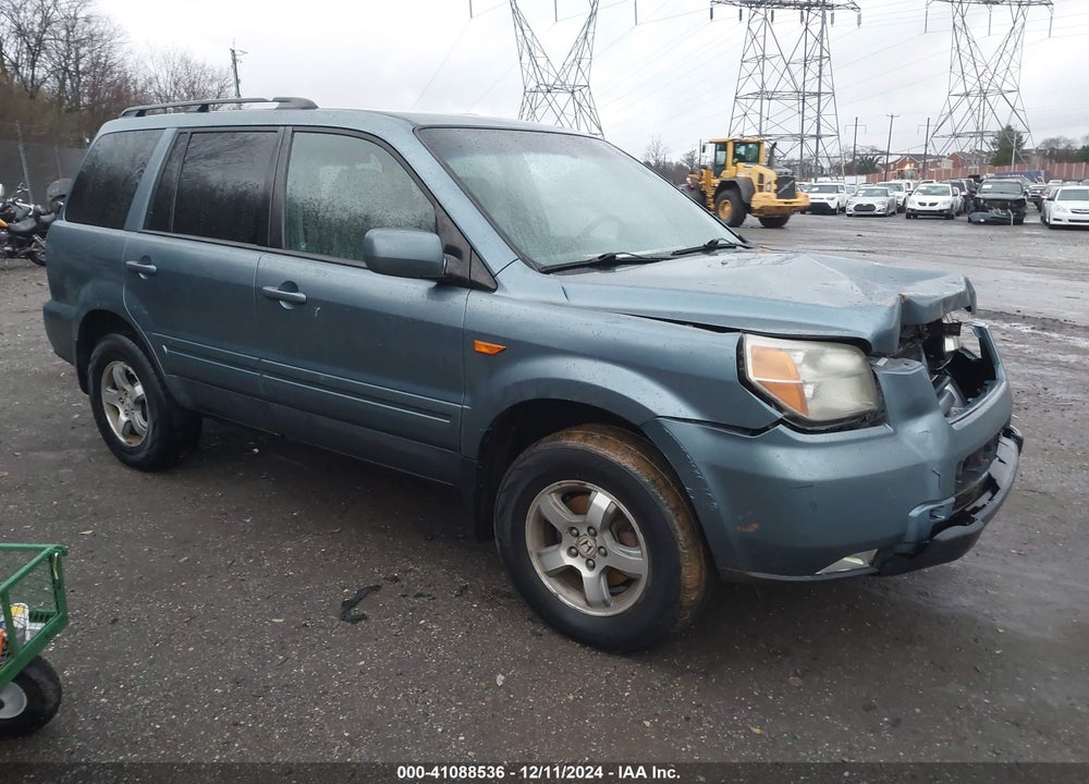 2007 HONDA PILOT EX-L VIN: 5FNYF18797B025063