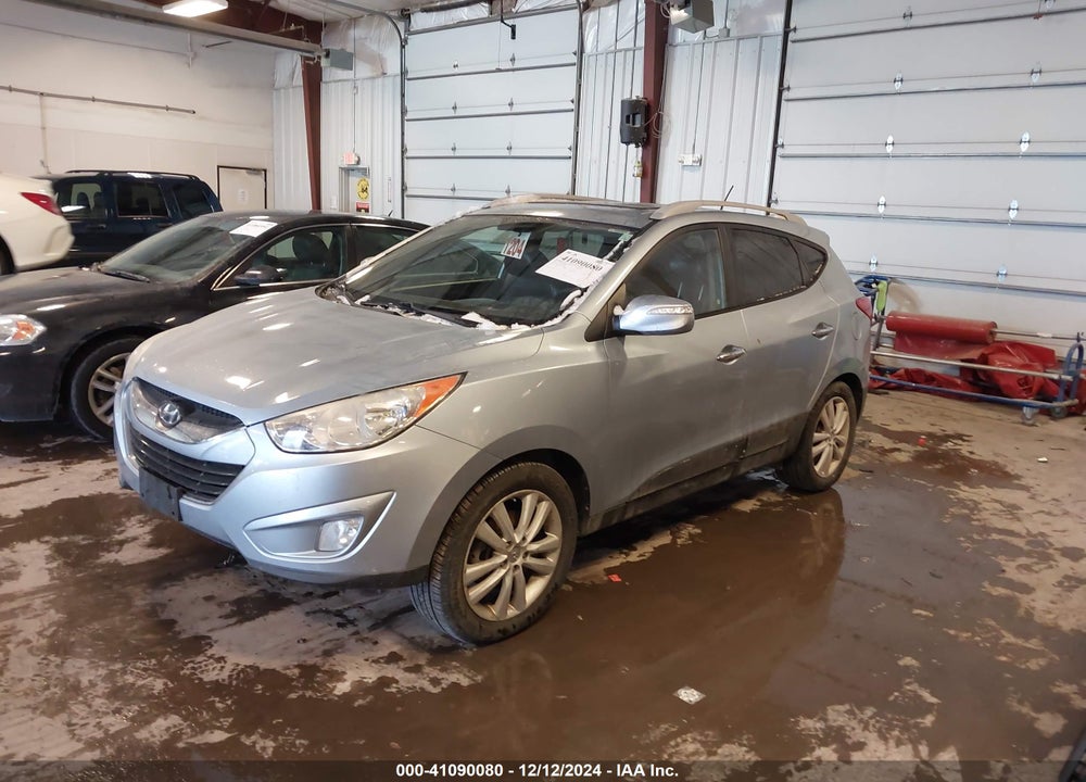 2010 HYUNDAI TUCSON LIMITED VIN: KM8JUCAC5AU056430