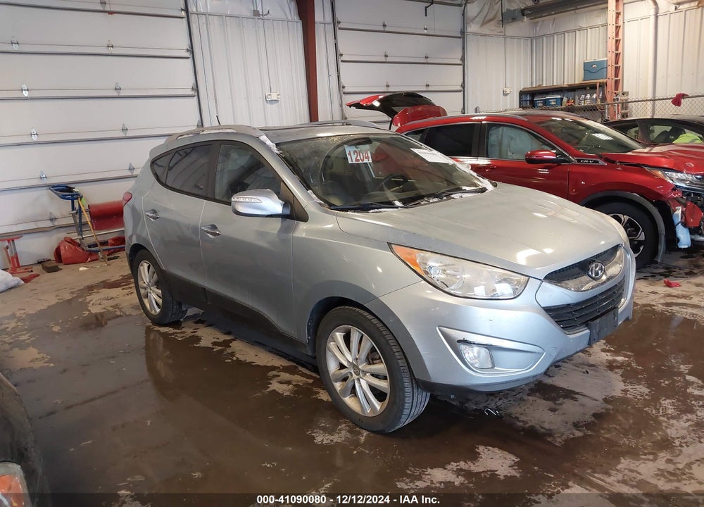 2010 HYUNDAI TUCSON LIMITED VIN: KM8JUCAC5AU056430