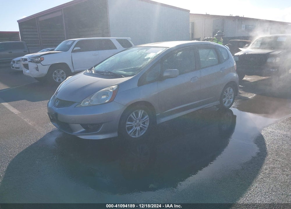 2009 HONDA FIT VIN: JHMGE88419S013734
