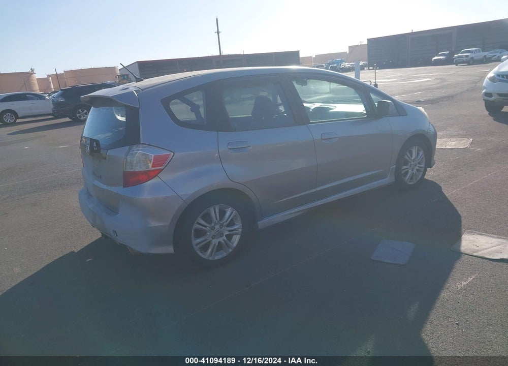 2009 HONDA FIT VIN: JHMGE88419S013734