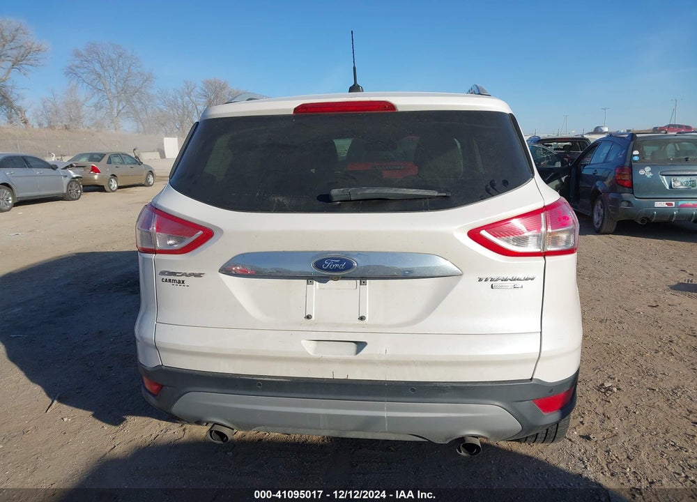 2016 FORD ESCAPE TITANIUM VIN: 1FMCU9JX1GUC42599