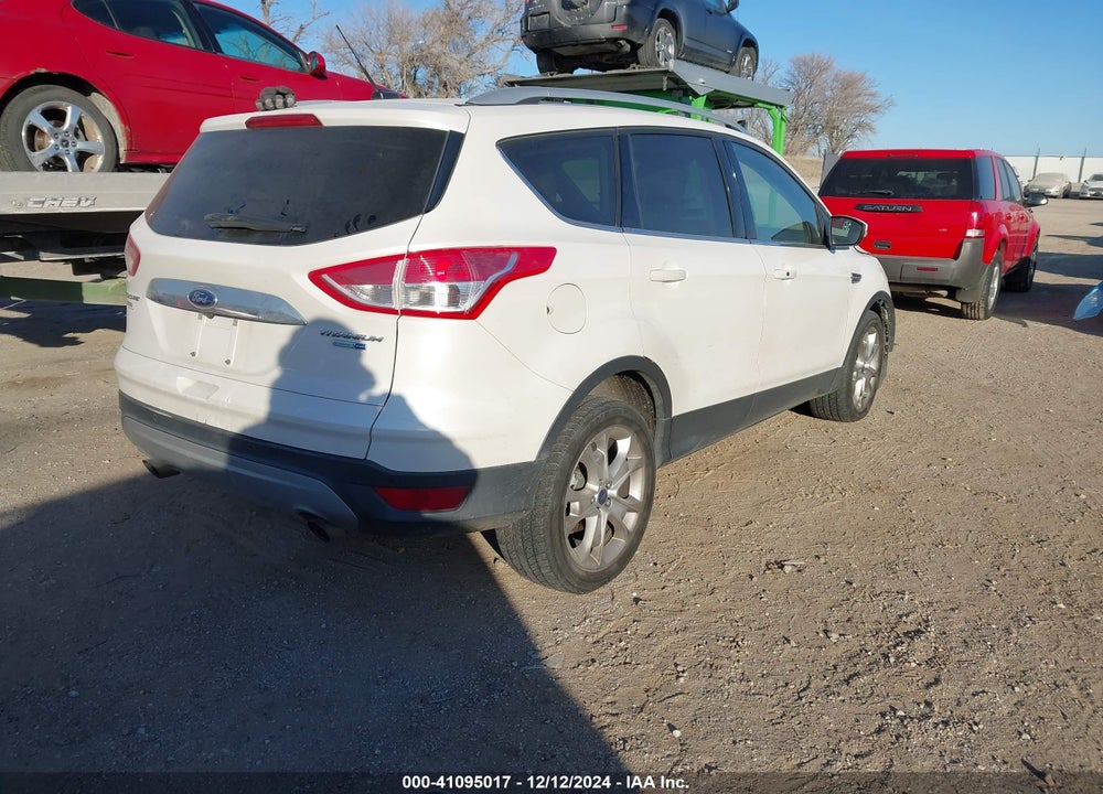 2016 FORD ESCAPE TITANIUM VIN: 1FMCU9JX1GUC42599