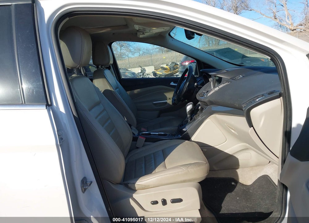 2016 FORD ESCAPE TITANIUM VIN: 1FMCU9JX1GUC42599
