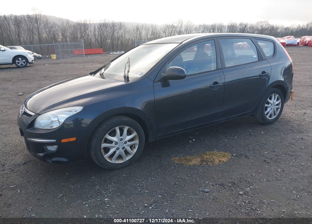 2009 HYUNDAI ELANTRA TOURING VIN: KMHDC86EX9U036662