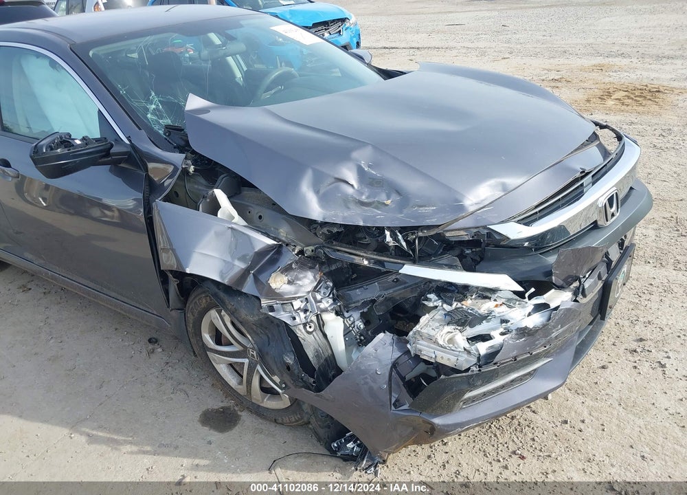 2018 HONDA CIVIC LX VIN: 2HGFC2F57JH594133
