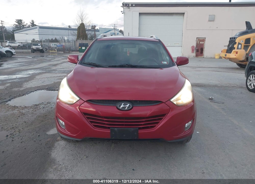 2014 HYUNDAI TUCSON SE VIN: KM8JUCAG8EU941018
