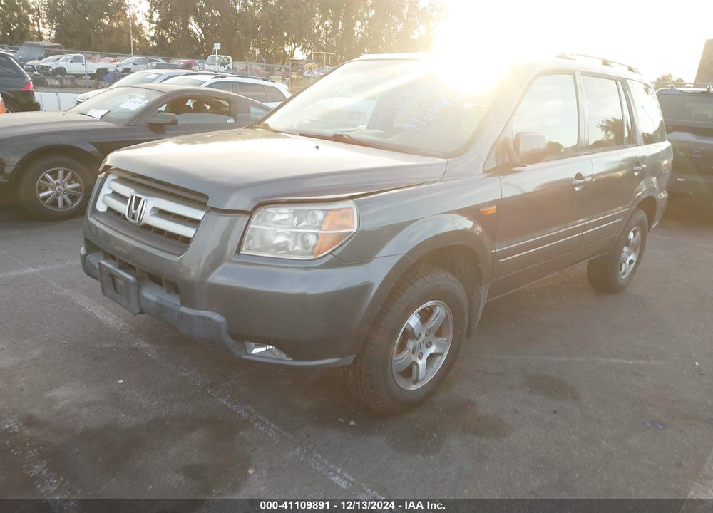 2007 HONDA PILOT EX-L VIN: 5FNYF28597B016142