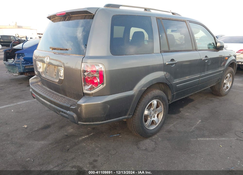 2007 HONDA PILOT EX-L VIN: 5FNYF28597B016142