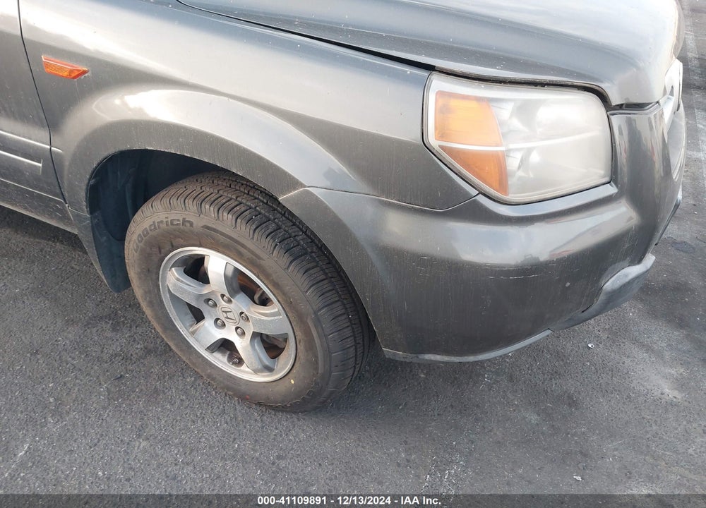 2007 HONDA PILOT EX-L VIN: 5FNYF28597B016142