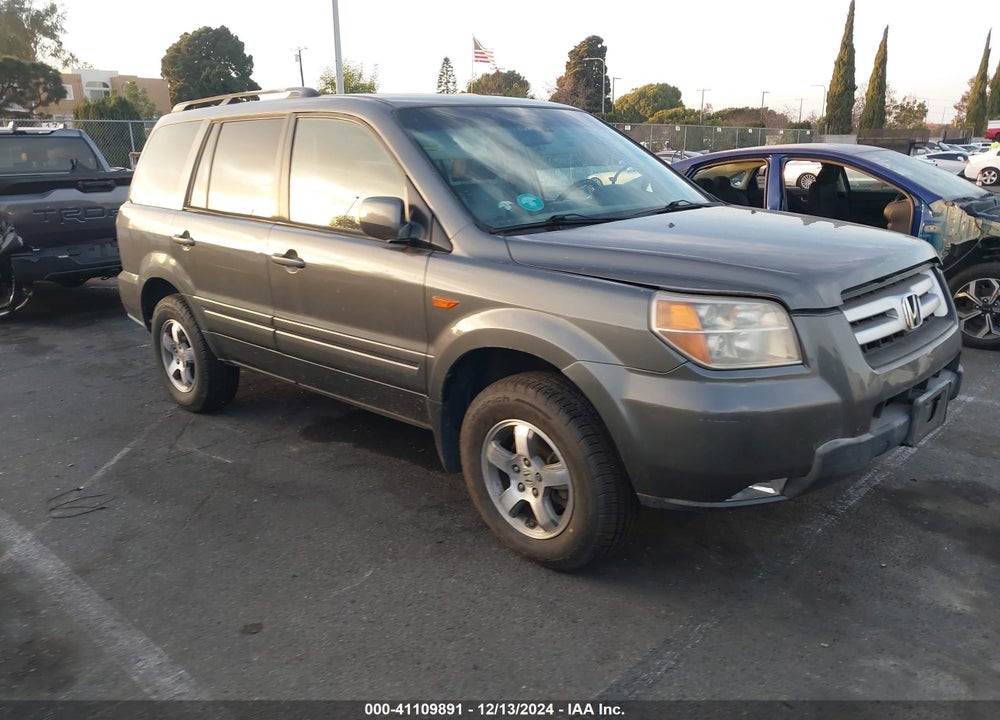 2007 HONDA PILOT EX-L VIN: 5FNYF28597B016142