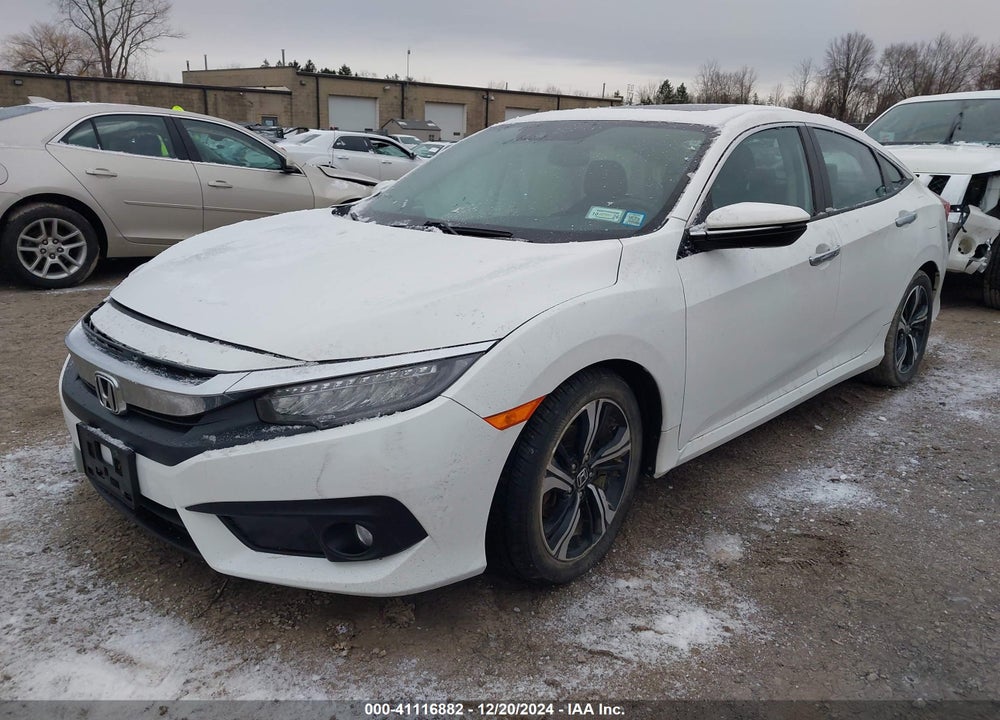 2016 HONDA CIVIC TOURING VIN: 19XFC1F95GE206428