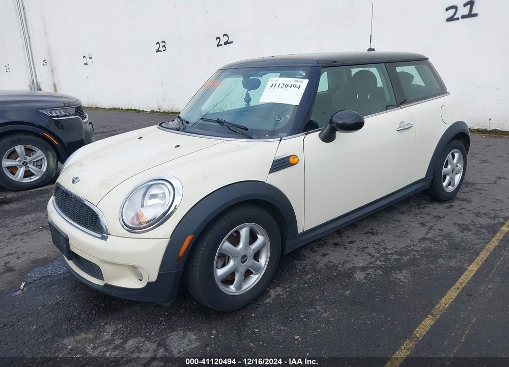 2007 MINI COOPER VIN: WMWMF33547TT53274