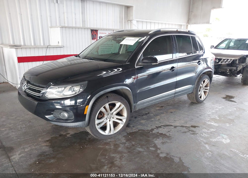 2013 VOLKSWAGEN TIGUAN SEL VIN: WVGBV7AX7DW523223