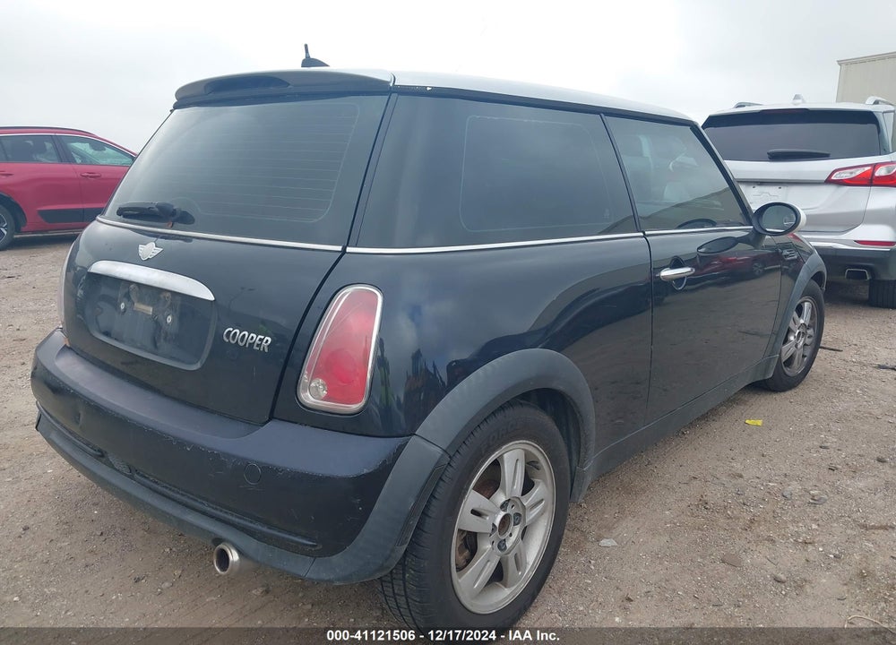 2006 MINI COOPER VIN: WMWRC33566TK16897