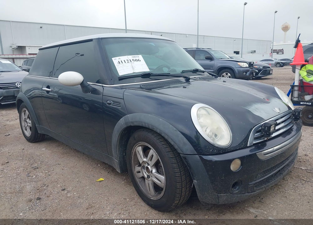 2006 MINI COOPER VIN: WMWRC33566TK16897