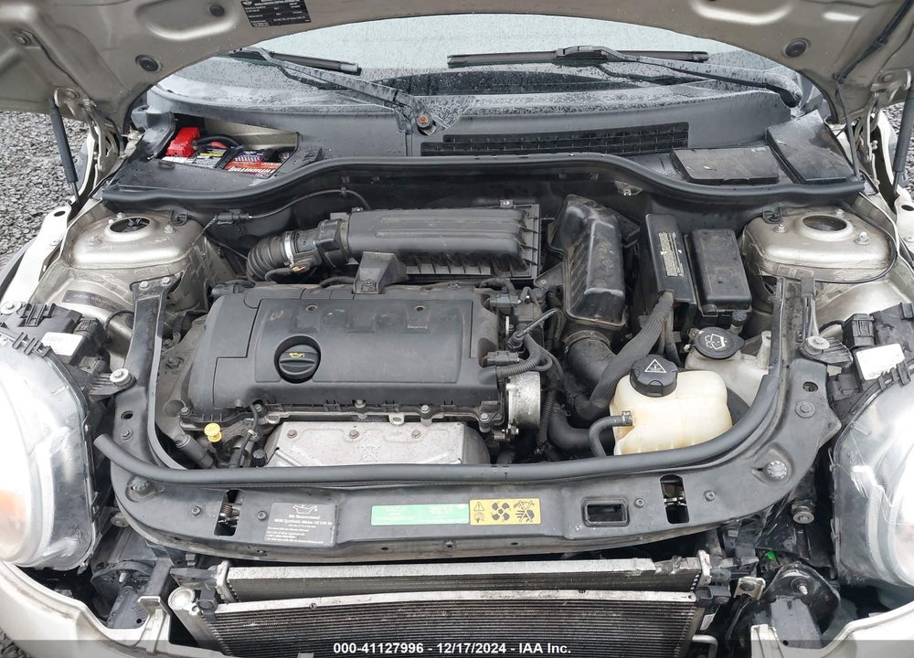 2009 MINI COOPER VIN: WMWMF335X9TW75064