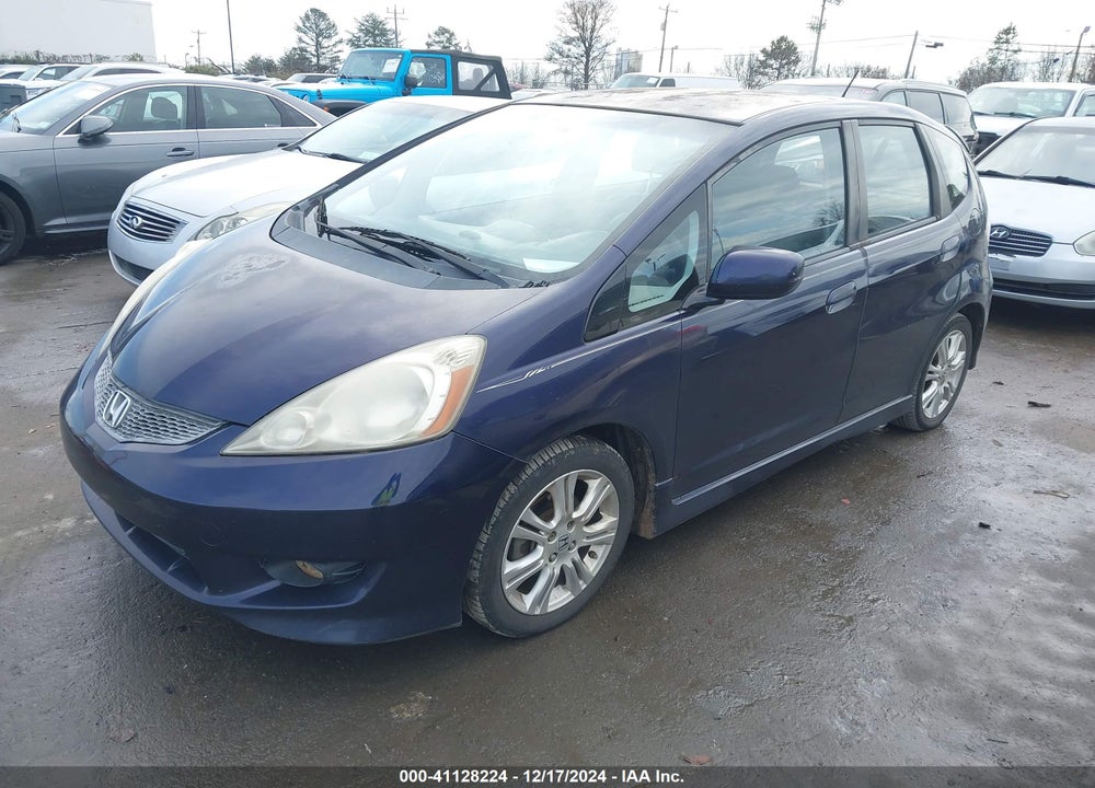 2009 HONDA FIT VIN: JHMGE88489S004612